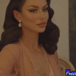 Glamorous burlesque performer introducing he massive natural tits