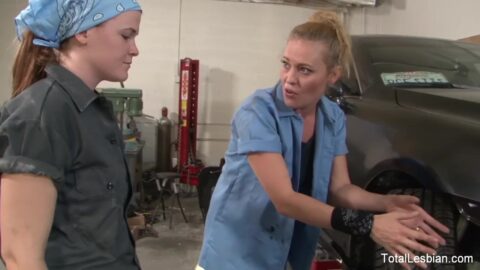 Slutty lesbians having fun in the public garage