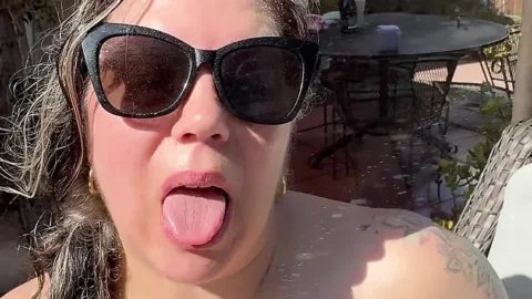 Hot Mom in bikini stripping and squirting in the backyard sun.