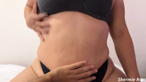 Playing with her tits until I come.