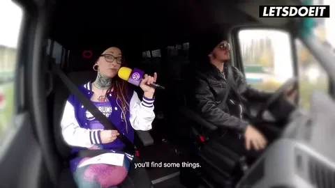 Redhead Removes Top in Van