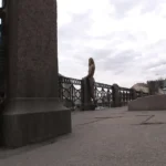 A shameless chick flashes her tits and ass on the streets and then goes anal fucking